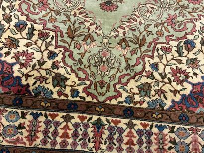 Oriental hand-knotted wool rug decorated...
