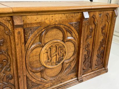 Church chest in molded and carved oak decorated...