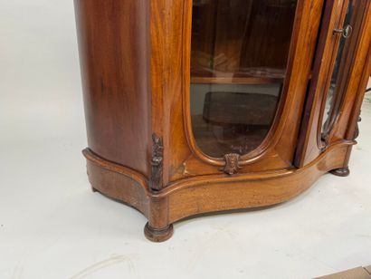 Small curved wooden display cabinet opening...