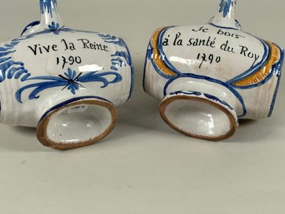 Two polychrome ceramic pourers marked 