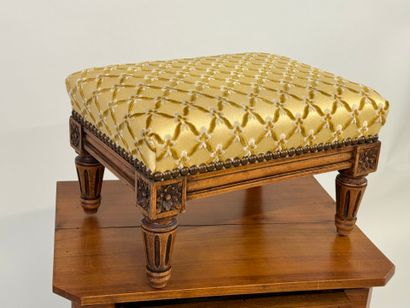 Molded wood footrest, upholstered in yellow...