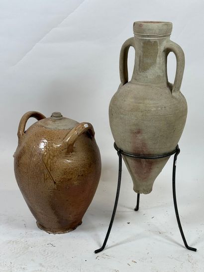 Jug and amphora presented on a tripod metal...
