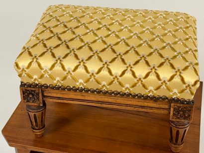 Molded wood footrest, upholstered in yellow...