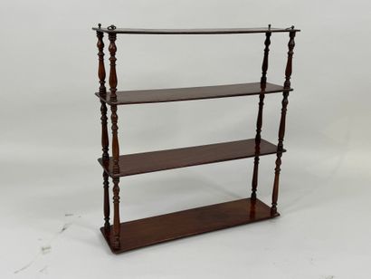 Four-tier mahogany wall shelf with turned...