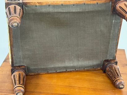 Molded wood footrest, upholstered in yellow...