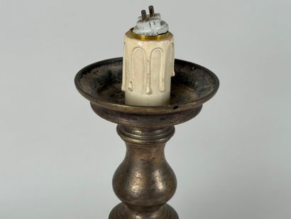Metal candlestick, circular base.
Mounted...