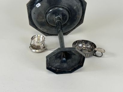 An octagonal bowl on a silver-plated metal...
