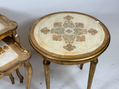 Set comprising two nesting tables and a circular...