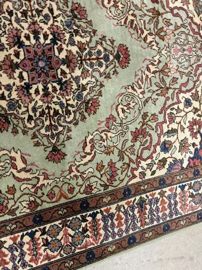 Oriental hand-knotted wool rug decorated...