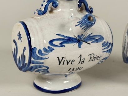 Two polychrome ceramic pourers marked 