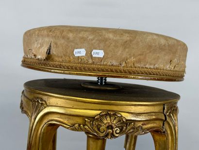Molded, carved and gilded wood piano stool.
19th...