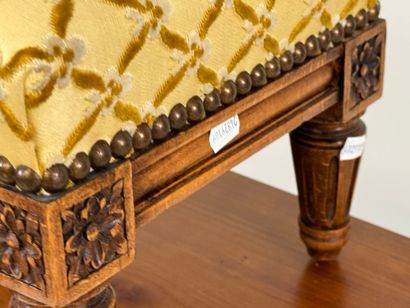 Molded wood footrest, upholstered in yellow...