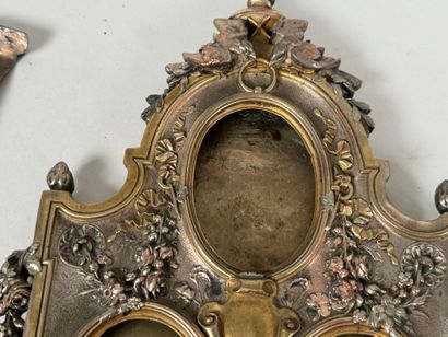 Pair of three-slot picture frames in metal...