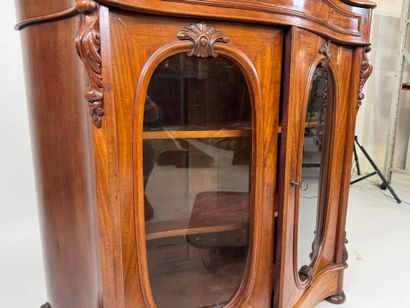 Small curved wooden display cabinet opening...