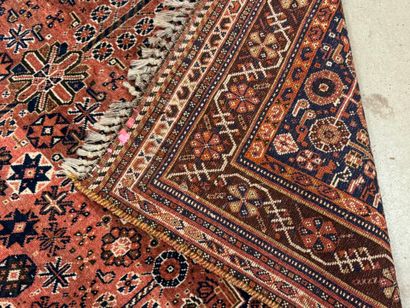 Oriental hand-knotted wool rug with stylized...