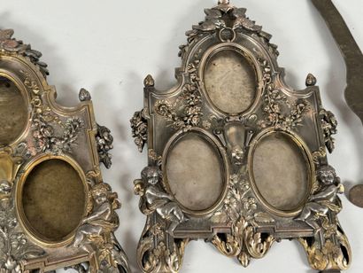Pair of three-slot picture frames in metal...