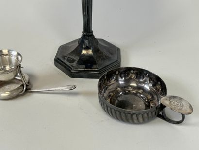 An octagonal bowl on a silver-plated metal...