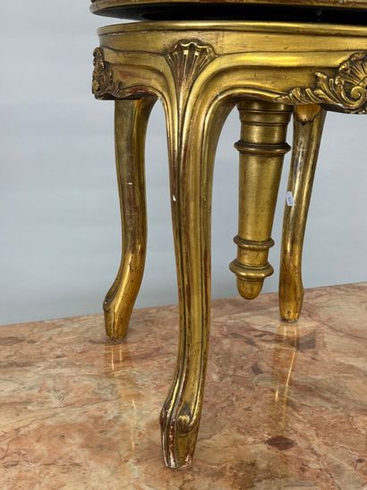 Molded, carved and gilded wood piano stool.
19th...