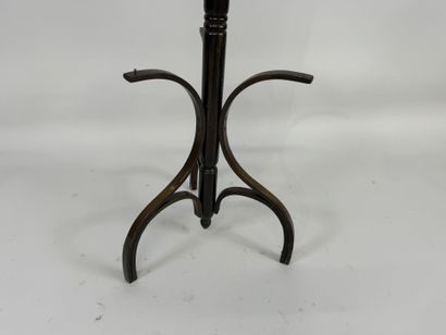 Stained wood coat rack with five pegs.
H....