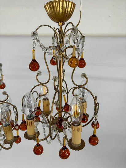 Pair of gilded metal chandeliers with colored...