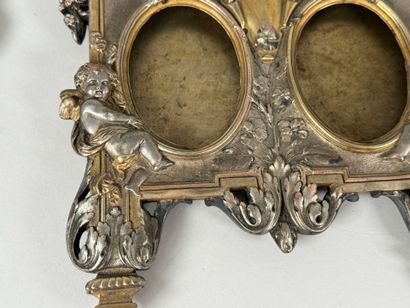 Pair of three-slot picture frames in metal...
