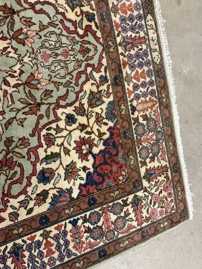 Oriental hand-knotted wool rug decorated...