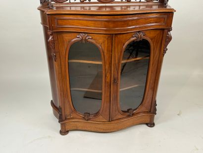 Small curved wooden display cabinet opening...