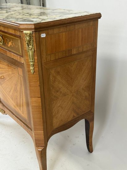 Small inlaid commode opening with two doors...