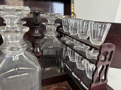Liqueur cellar in blackened wood and brass...