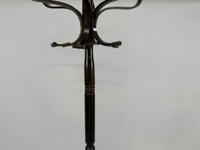 Stained wood coat rack with five pegs.
H....
