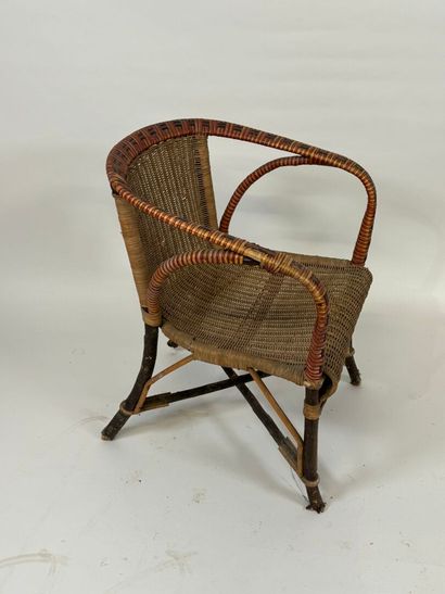 Wood and rattan armchair, X-shaped brace.
70...