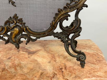 Spark arrester in chased brass, the central...