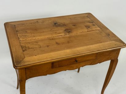 Cherry wood writing table opening with one...