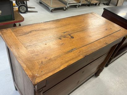 Natural wood chest of drawers with half detached...