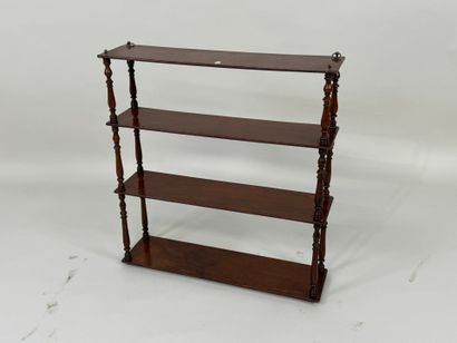 Four-tier mahogany wall shelf with turned...