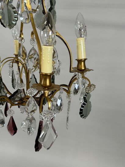 Brass chandelier with eight lights and crystal...