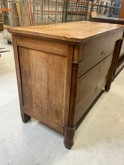 Natural wood chest of drawers with half detached...