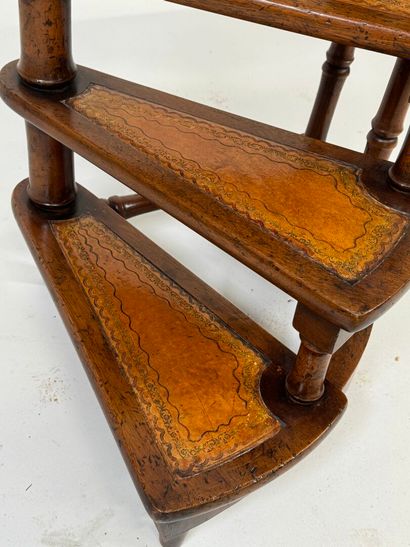 Small wooden staircase with four steps and...