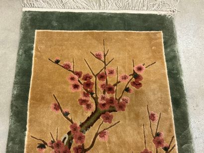 Small silk carpet with polychrome decoration...