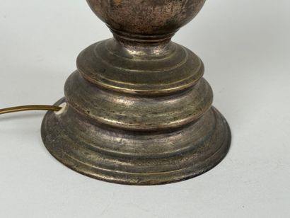 Metal candlestick, circular base.
Mounted...
