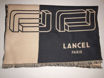 LANCEL, PARIS.
Fringed wool scarf decorated...