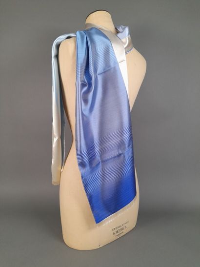 Lot including:
- DKNY.
Silk twill square...