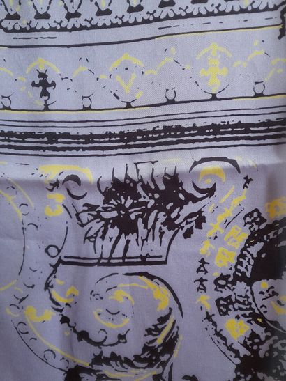 Lot including: 
-NODUS.
Woolen scarf with...