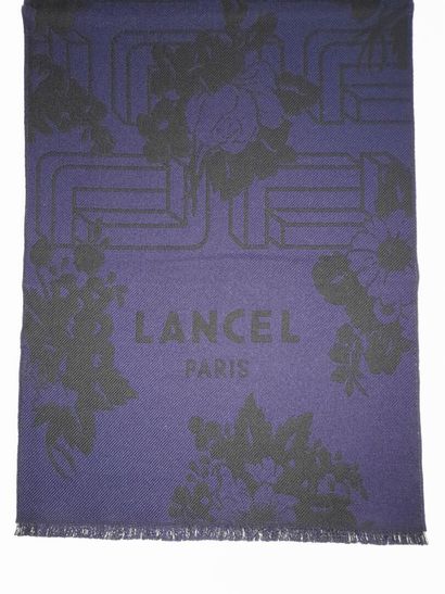 LANCEL, PARIS.
Fringed wool scarf decorated...