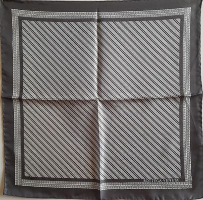Lot including:
- MONCLER.
Silk twill square...