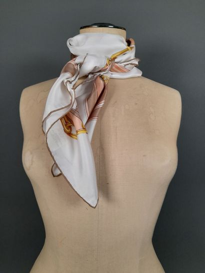 BALLY.
Silk twill square decorated with buckles,...