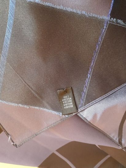 Lot including:
- ALAIN FIGARET.
Fringed viscose...
