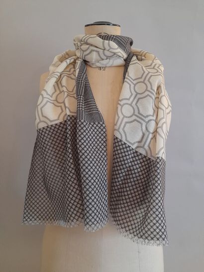 Lot including: 
-NODUS.
Woolen scarf with...