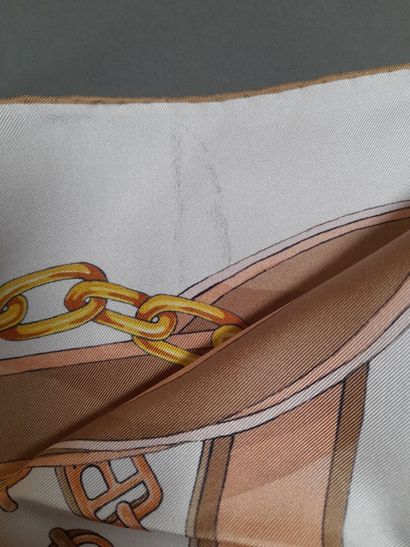 BALLY.
Silk twill square decorated with buckles,...