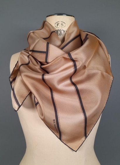 BURBERRY.
Silk twill square decorated with...
